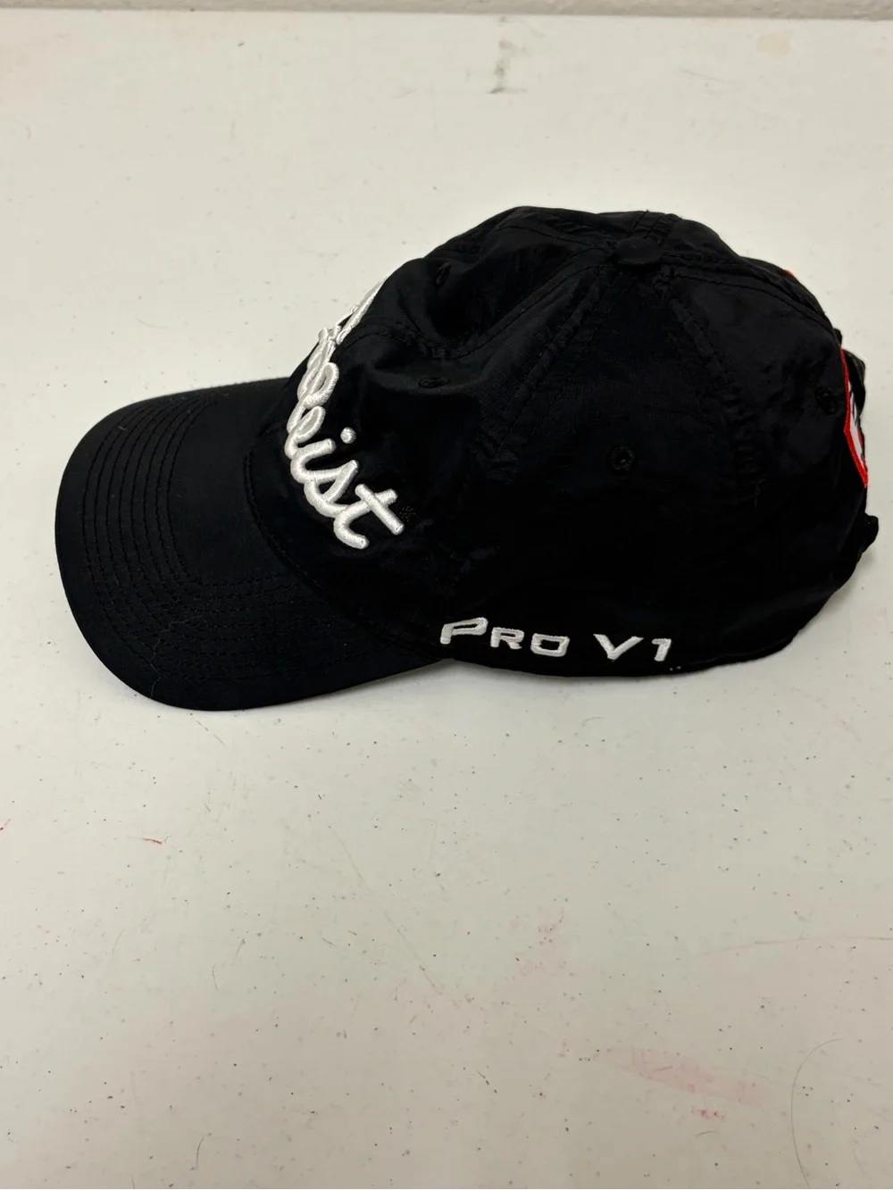Titleist Black Hat with White Script Logo